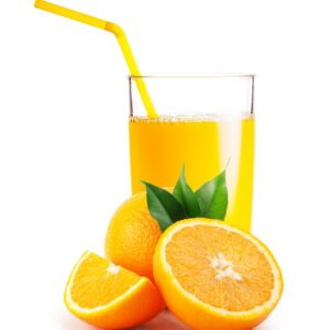 Glass of orange juice and the oranges